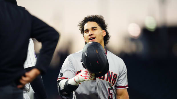 Alek Thomas reacts to a ball put in play against the Colorado Rockies at Coors Field.